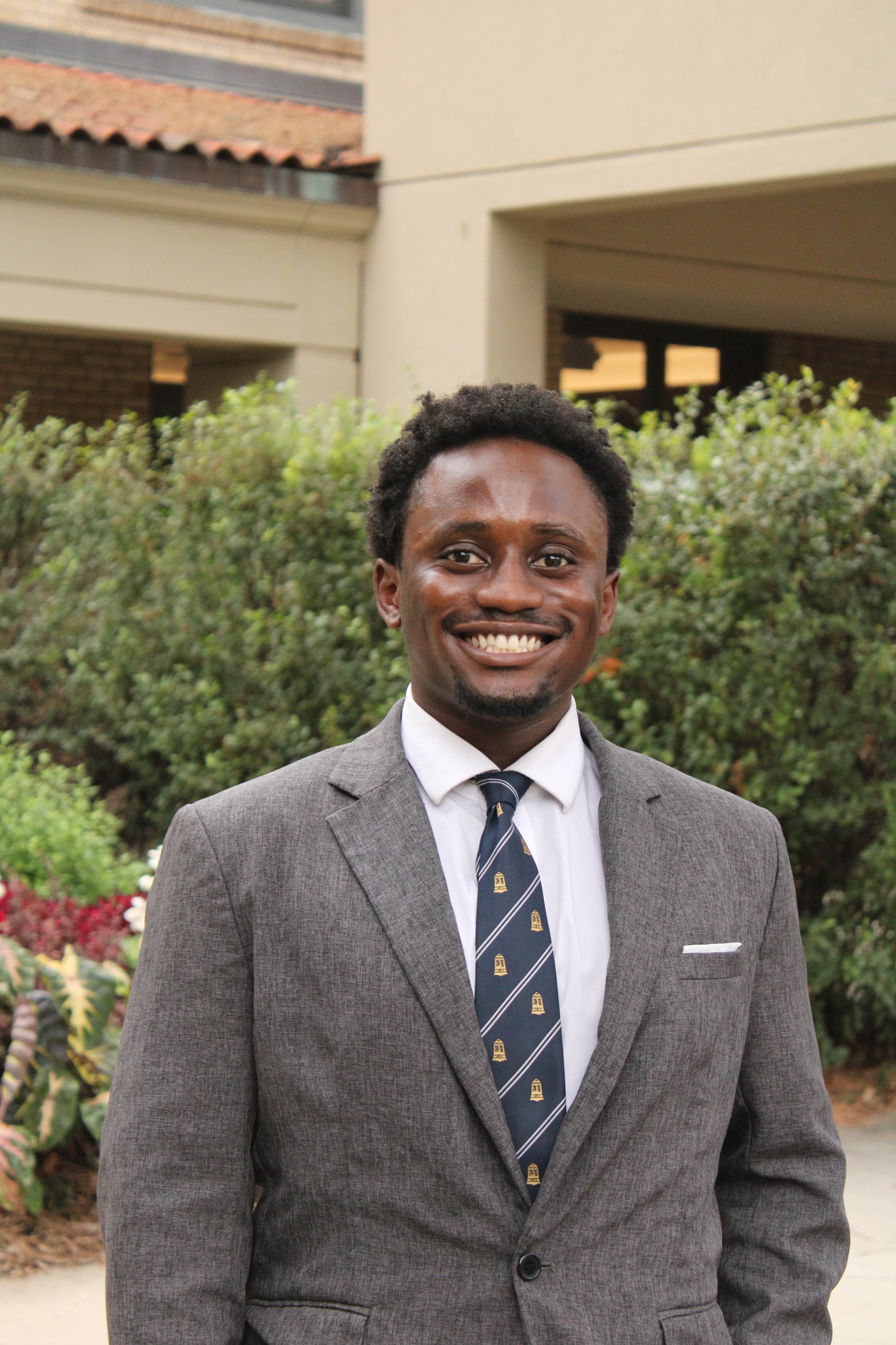 Headshot of Abraham Mapatano